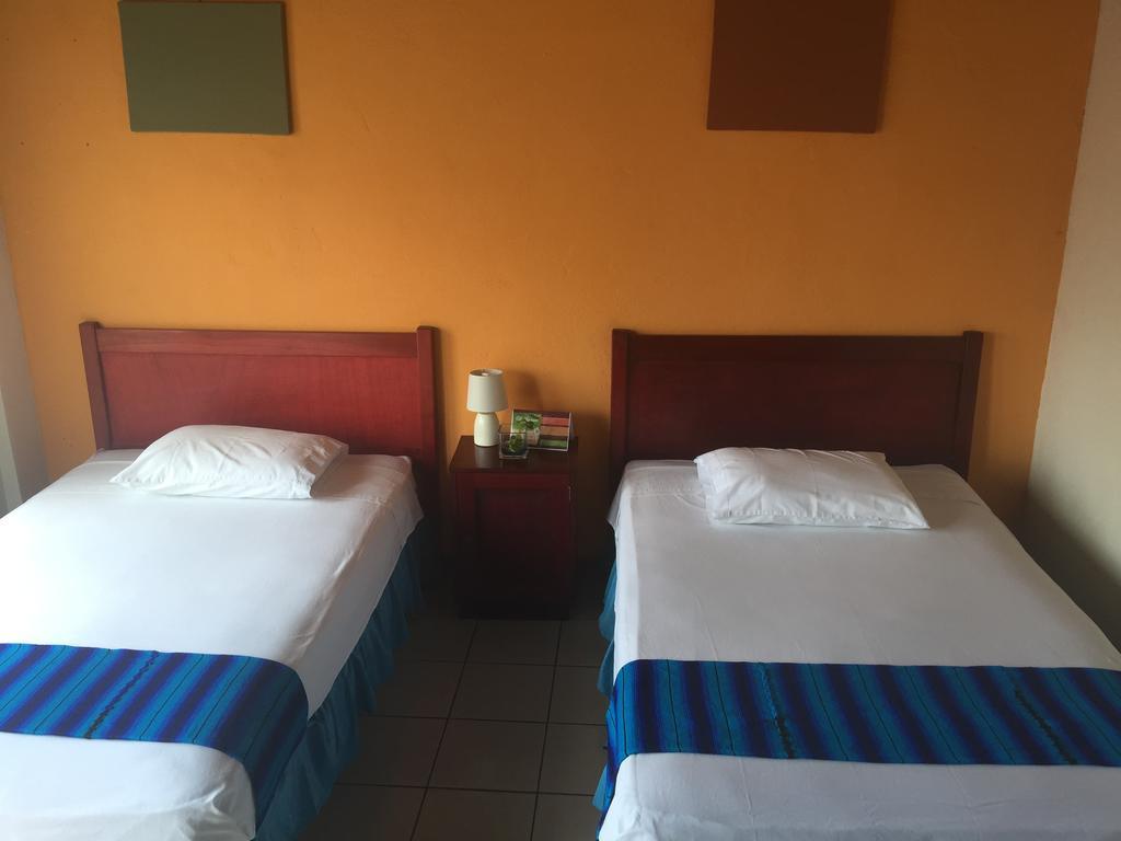 Hotel Villa Margarita Flores Quarto foto
