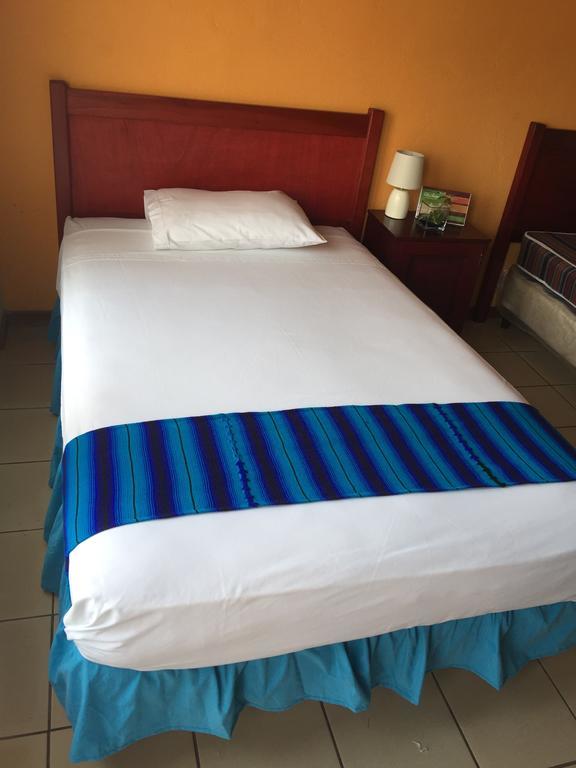 Hotel Villa Margarita Flores Quarto foto