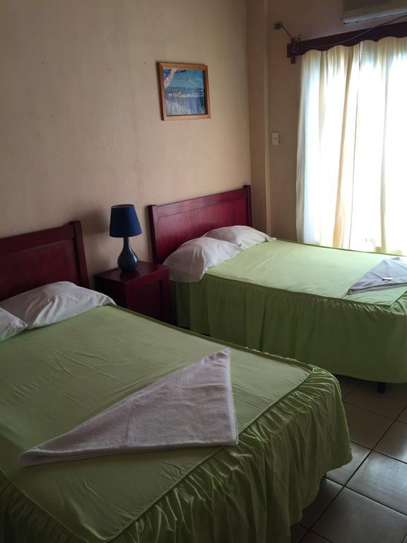 Hotel Villa Margarita Flores Quarto foto